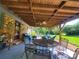 Spacious covered patio with outdoor seating, perfect for relaxing and entertaining at 2104 Farmbrook Dr, Statesville, NC 28625
