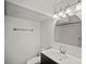 Cozy bathroom with modern vanity, large mirror, and great lighting at 218 Water Oak Dr, Pineville, NC 28134