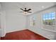 Bedroom with hardwood floors, ceiling fan, and great natural light at 218 Water Oak Dr, Pineville, NC 28134