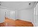 Spacious living room with hardwood floors and a view to the hallway at 218 Water Oak Dr, Pineville, NC 28134