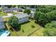 Aerial view of the backyard featuring mature trees and a full fence at 23 Redwood Ct, Alexander, NC 28601