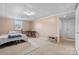Spacious basement room with a door leading to storage area at 23 Redwood Ct, Alexander, NC 28601