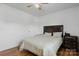 Comfortable bedroom featuring hardwood floors and neutral walls at 23 Redwood Ct, Alexander, NC 28601