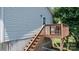 Deck with stairs leading down to the fenced yard at 23 Redwood Ct, Alexander, NC 28601