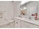 Bright bathroom with double vanity and a large mirror at 2324 Loire Valley Dr, Indian Land, SC 29707