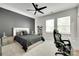 Bedroom with a black bed and a modern ceiling fan at 2324 Loire Valley Dr, Indian Land, SC 29707