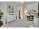 Well-organized Bedroom with changing table, storage shelves, and charming decor at 2324 Loire Valley Dr, Indian Land, SC 29707