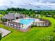 Community pool with pergolas, seating areas and lush landscaping at 2324 Loire Valley Dr, Indian Land, SC 29707