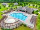 Aerial view of the community pool and clubhouse, with pergolas and seating areas at 2324 Loire Valley Dr, Indian Land, SC 29707