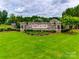 Stone sign for the 'Bretagne' community, surrounded by manicured landscaping at 2324 Loire Valley Dr, Indian Land, SC 29707