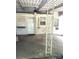 Covered back porch with a fan and white door leading into the house at 237 Institute St, Mooresville, NC 28115