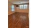 Comfortable bedroom with hardwood floors and lots of natural light at 237 Institute St, Mooresville, NC 28115
