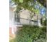 Charming front porch with decorative iron railing, white siding, and well-maintained landscaping at 237 Institute St, Mooresville, NC 28115