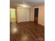 Inviting living room with hardwood floors and large closet at 237 Institute St, Mooresville, NC 28115