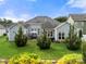 Aerial view of the backyard showing a large well maintained lawn at 2399 Ashbourne Se Pl, Concord, NC 28025