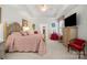 Spacious main bedroom with light-colored walls, and tray ceiling at 2399 Ashbourne Se Pl, Concord, NC 28025