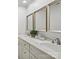 This primary bathroom offers double sinks, marble countertops, and brushed nickel hardware at 2432 Hartmill Ct, Charlotte, NC 28226