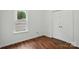 Bedroom featuring natural light from the window and a closet for organized storage at 2723 Craddock Ave, Charlotte, NC 28208