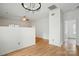 Open floor plan with hardwood floors, and ample natural light and access to more rooms at 2723 Craddock Ave, Charlotte, NC 28208