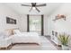 Inviting bedroom with window views, fan, and stylish decor is perfect for children at 2732 Berkhamstead Cir, Concord, NC 28027