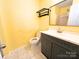 Functional bathroom featuring a vanity, toilet, and tile flooring at 3051 Dairy Farm Dr, Monroe, NC 28110