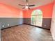 Cozy bedroom featuring neutral walls, laminate floors and a large window, offering a peaceful ambiance at 3051 Dairy Farm Dr, Monroe, NC 28110