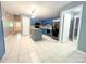 Well-equipped kitchen featuring blue cabinetry, stainless steel appliances, and an island at 3051 Dairy Farm Dr, Monroe, NC 28110