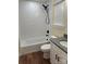 Bathroom features a bathtub/shower, modern fixtures, granite countertops, and a stylish vanity at 307 Wilson St, Monroe, NC 28112