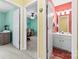 Bathroom featuring a vanity with cabinets and drawers, tile flooring, and three-bulb vanity light fixture at 3247 Mannington Dr, Charlotte, NC 28270