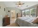 Primary bedroom with a vaulted ceiling, walk-in closet, and en-suite bathroom at 3247 Mannington Dr, Charlotte, NC 28270