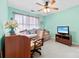 Bright bedroom with desk, chair, and daybed with a ceiling fan at 3247 Mannington Dr, Charlotte, NC 28270