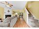 Inviting living room featuring a fireplace and an adjacent dining area, creating an open flow at 3247 Mannington Dr, Charlotte, NC 28270