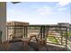 Apartment balcony featuring outdoor seating and a view of the surrounding cityscape at 333 W Trade St # 1106, Charlotte, NC 28202