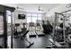 Bright fitness center with treadmills, weights, and large windows offering city views at 333 W Trade St # 1106, Charlotte, NC 28202