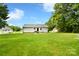 Spacious backyard showcasing a well-maintained lawn and charming patio, creating an inviting outdoor space at 339 Brown Rd, China Grove, NC 28023