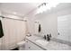 Bathroom featuring granite countertops, a modern mirror, and sleek fixtures at 339 Brown Rd, China Grove, NC 28023