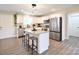 Modern kitchen with granite countertops, stainless steel appliances, and a center island at 339 Brown Rd, China Grove, NC 28023