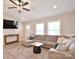 Comfortable living room with a large sectional sofa and a mounted TV for entertainment at 339 Brown Rd, China Grove, NC 28023