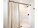 Clean shower showcasing a functional showerhead and sleek curtain rod at 339 Brown Rd, China Grove, NC 28023