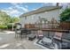 Backyard featuring outdoor patio and wood deck with seating at 3500 Cedar Springs Sw Dr, Concord, NC 28027