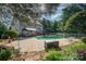 Beautiful backyard featuring a pool, gazebo, and a well-maintained lawn at 3500 Cedar Springs Sw Dr, Concord, NC 28027