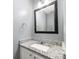 Granite counters accent this bathroom and a decorative mirror for appeal at 3500 Cedar Springs Sw Dr, Concord, NC 28027