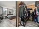View of primary bedroom and open closet with shelves and rods at 3500 Cedar Springs Sw Dr, Concord, NC 28027
