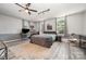 This spacious bedroom has wood floors and a lovely grey and white decor at 3500 Cedar Springs Sw Dr, Concord, NC 28027