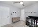 Bedroom with a grey paint job, cartoon themed decorations, and a black crib at 3500 Cedar Springs Sw Dr, Concord, NC 28027
