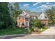 Charming two-story home with a brick and siding exterior and well-maintained landscaping at 3500 Cedar Springs Sw Dr, Concord, NC 28027