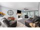 Bright living room featuring a fireplace, comfortable seating, and stylish decor at 3500 Cedar Springs Sw Dr, Concord, NC 28027