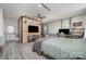 Spacious main bedroom featuring a wood wall feature, and a ceiling fan at 3500 Cedar Springs Sw Dr, Concord, NC 28027