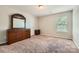 Bright bedroom featuring neutral carpet and a window for natural light at 4151 Granite St, Midland, NC 28107