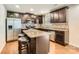 Spacious kitchen showcasing granite counters, stainless steel appliances, and an island with bar seating at 4151 Granite St, Midland, NC 28107